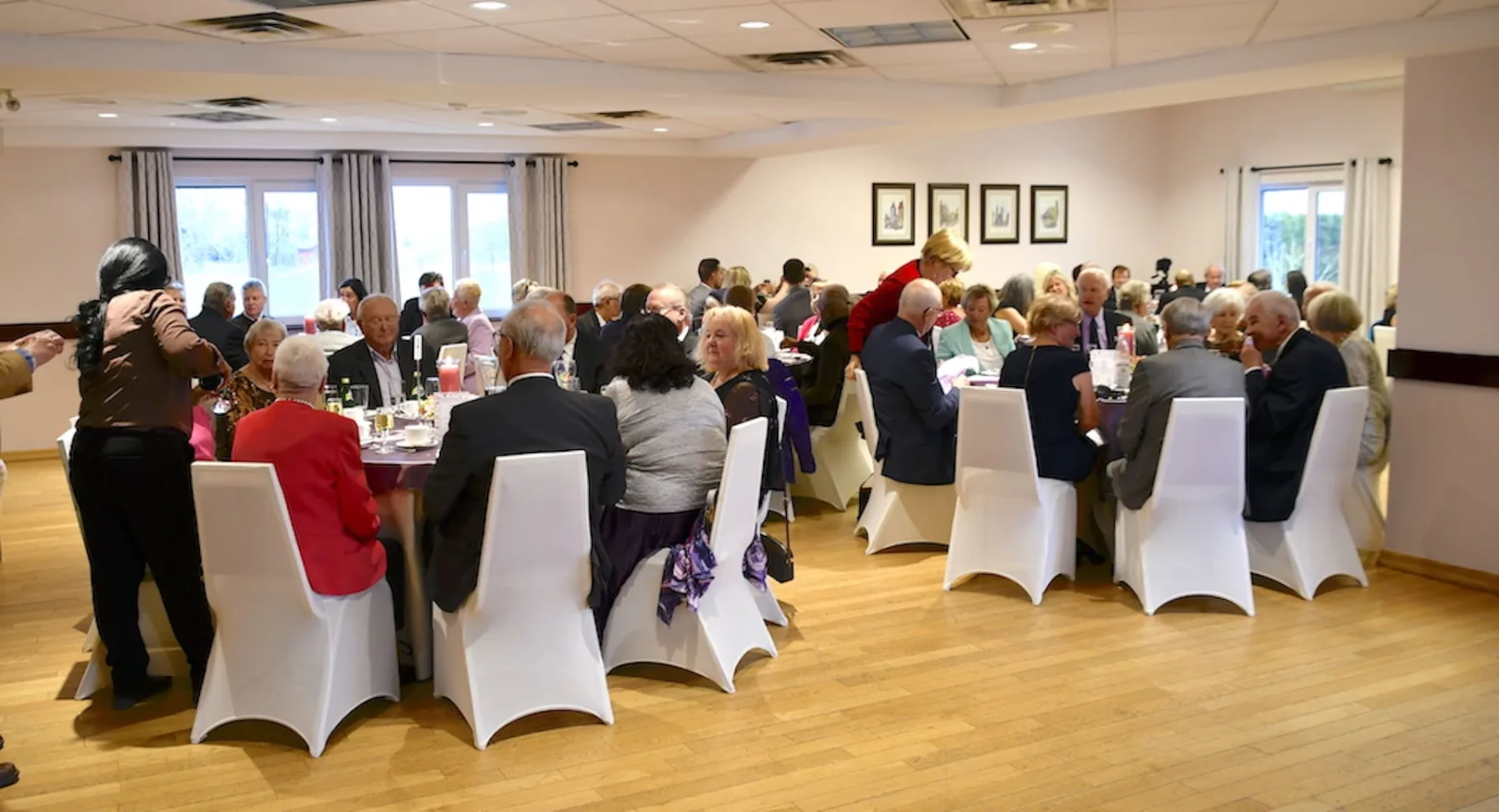 Guests gathering at a Hansa Haus event